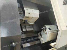 处置积压二手【沈阳HTC3255数控斜身车床】中空12寸卡盘